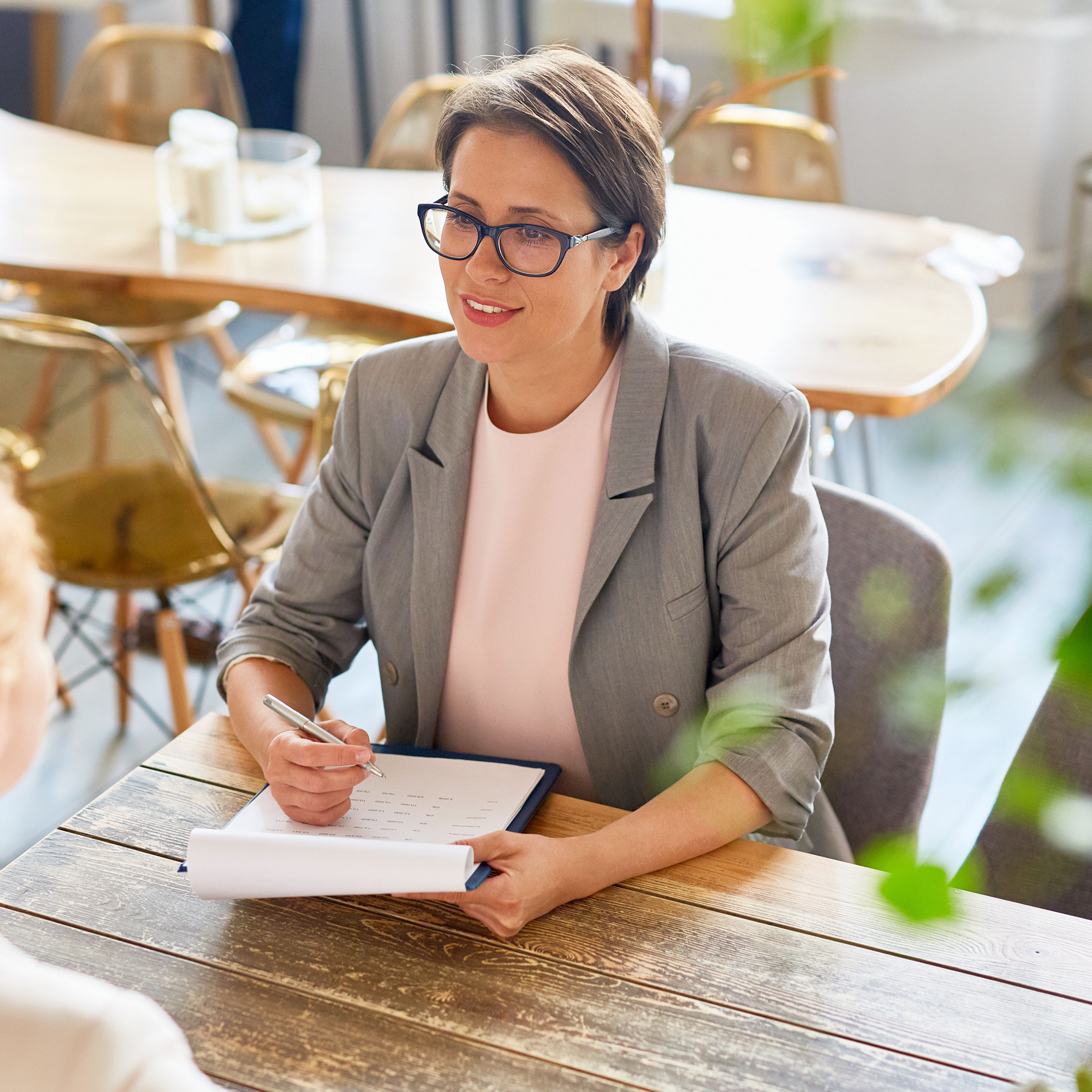 klosterfrau healthcare group woman business table